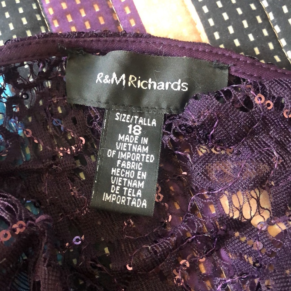 2 piece pant and top set. Plum color very comfortable material. Never worn.